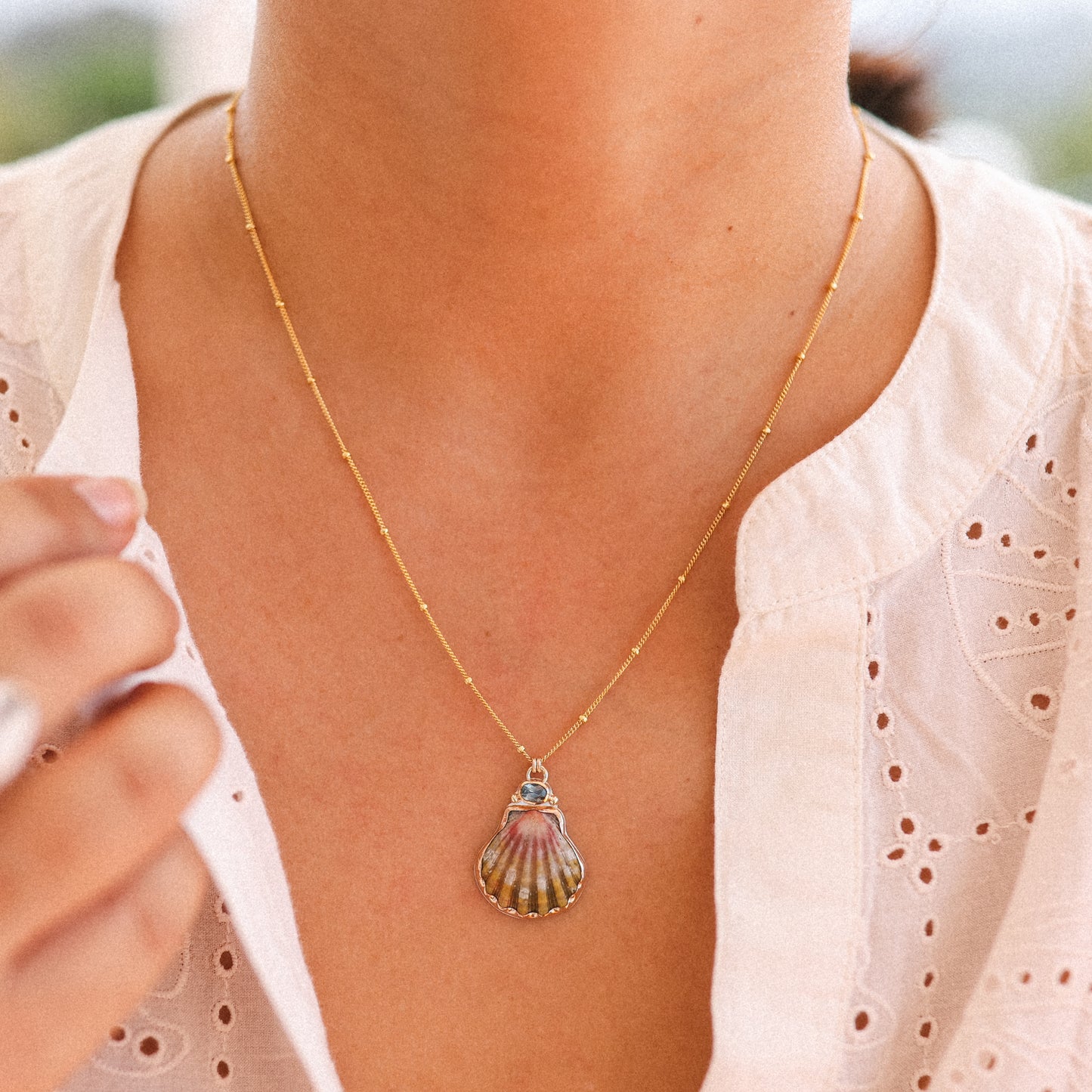 Gold Sunrise Shell and Sapphire Necklaces