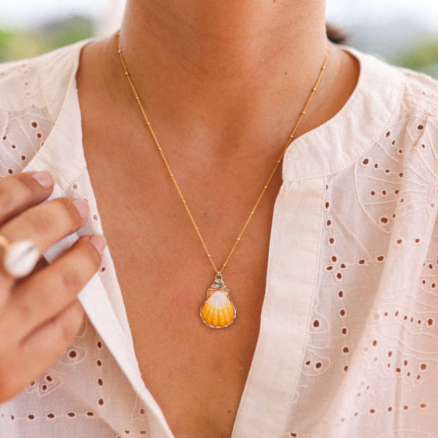 Gold Sunrise Shell and Sapphire Necklaces