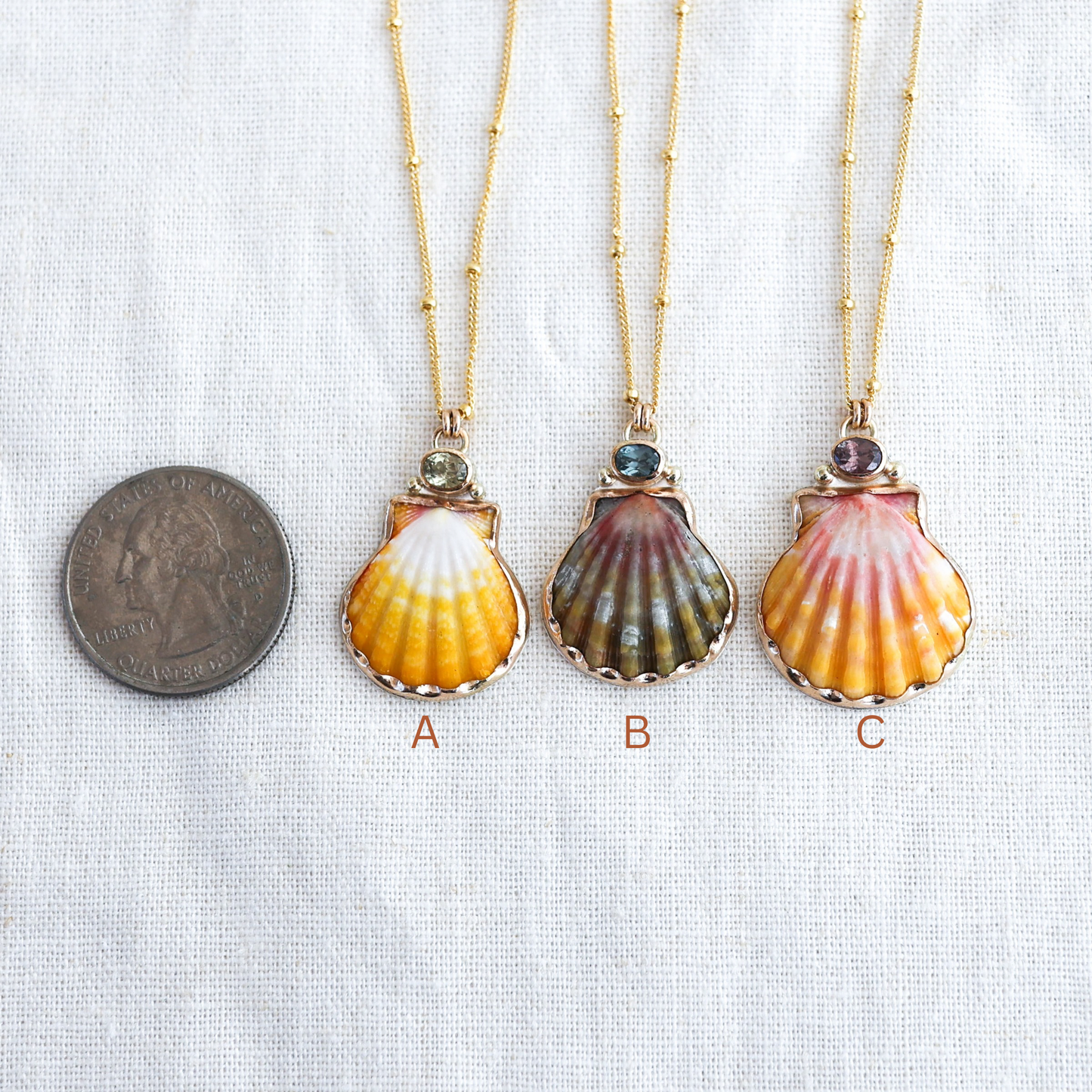 Gold Sunrise Shell and Sapphire Necklaces