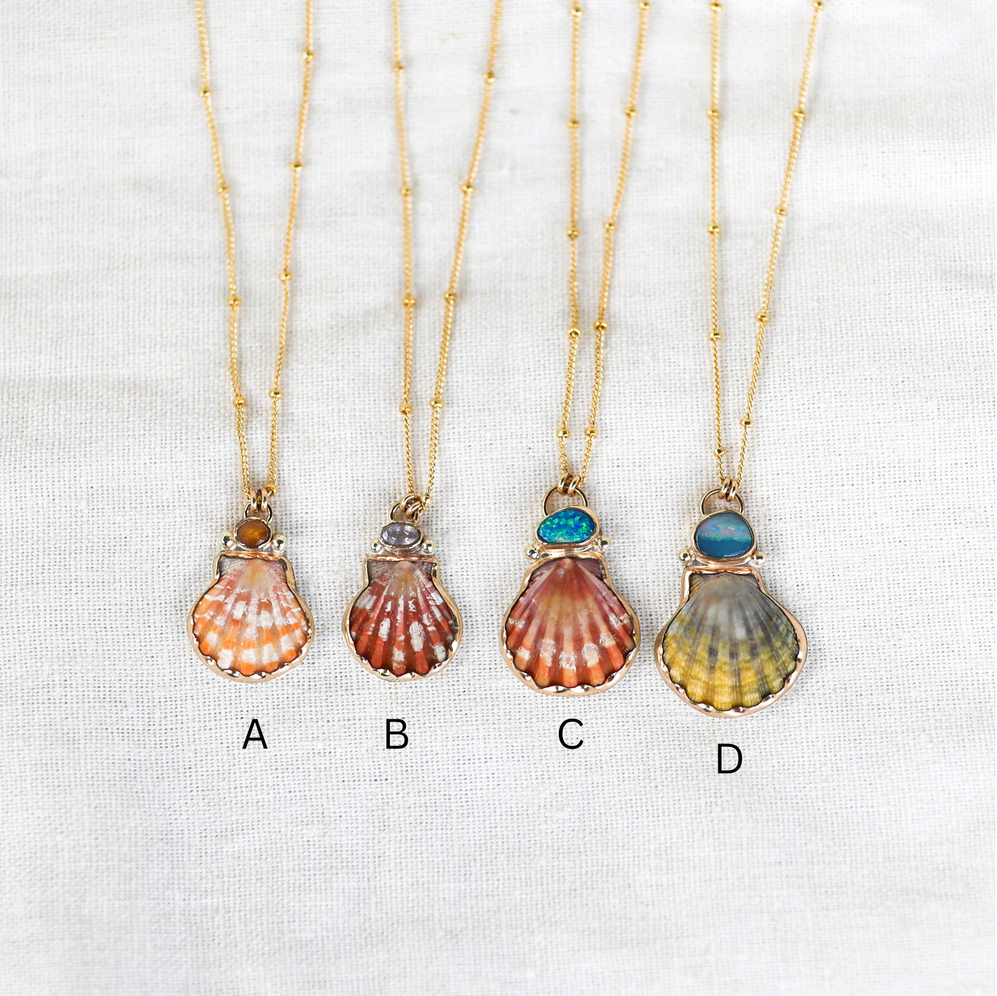 Gold Sunrise Shell and Sapphire Necklaces and Sunrise Shell and Australian Opal Necklace