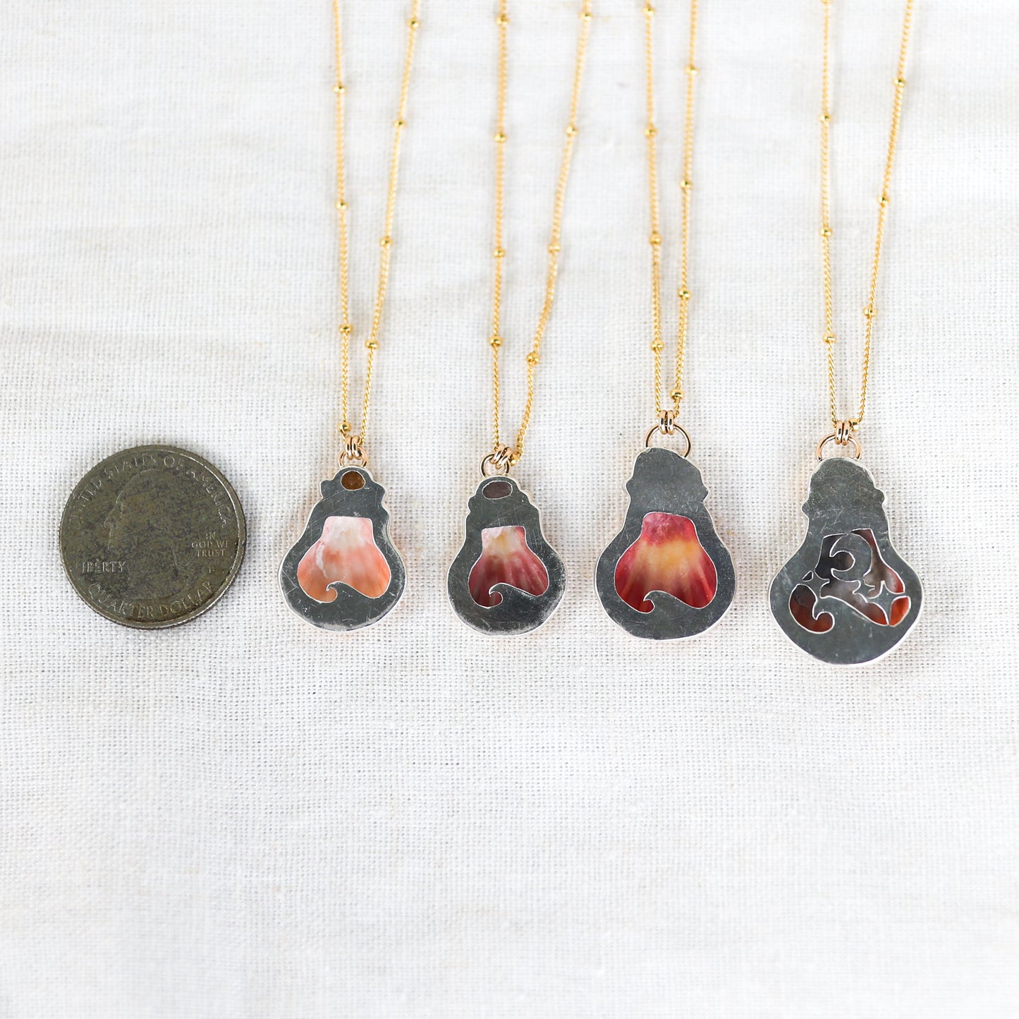 Gold Sunrise Shell and Sapphire Necklaces and Sunrise Shell and Australian Opal Necklace