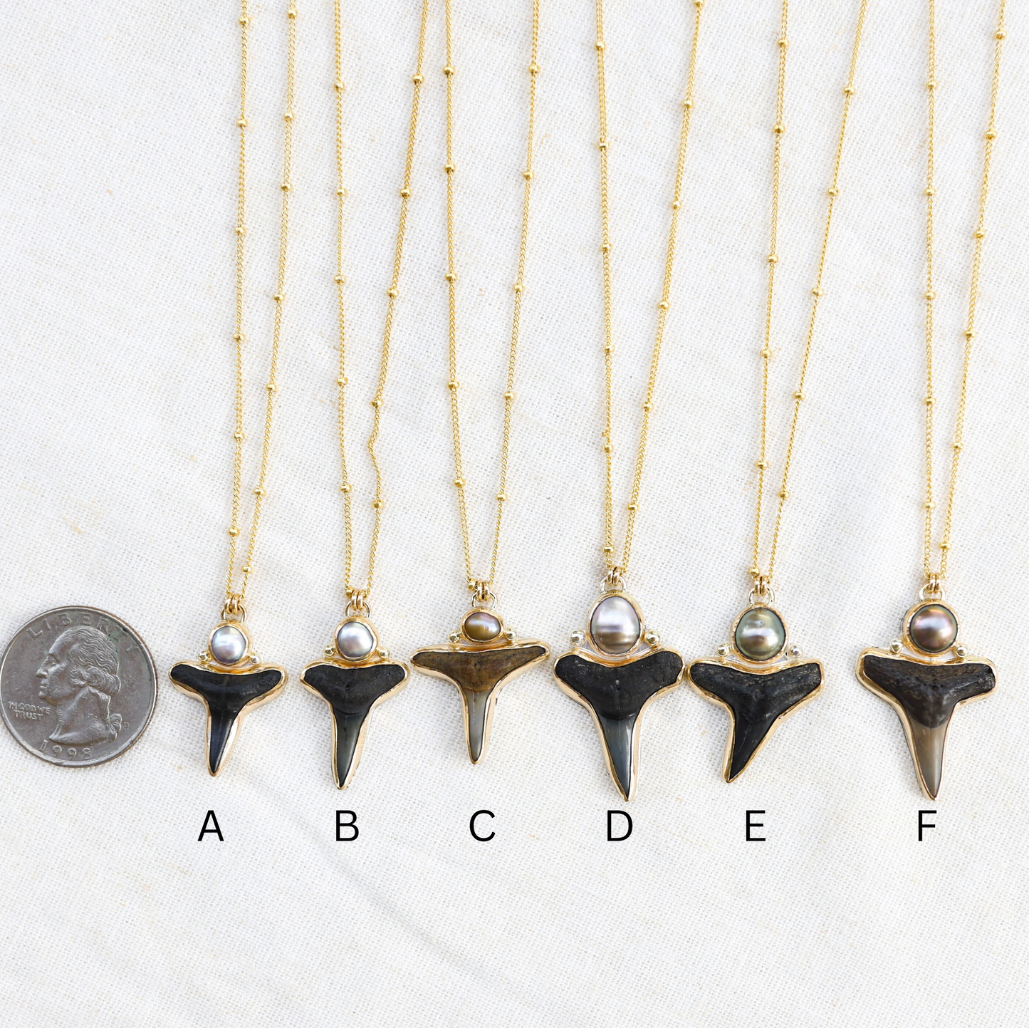 Gold Shark Tooth and Tahitian Pearl Necklaces